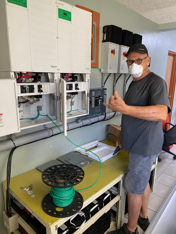 Technicians installing RO unit