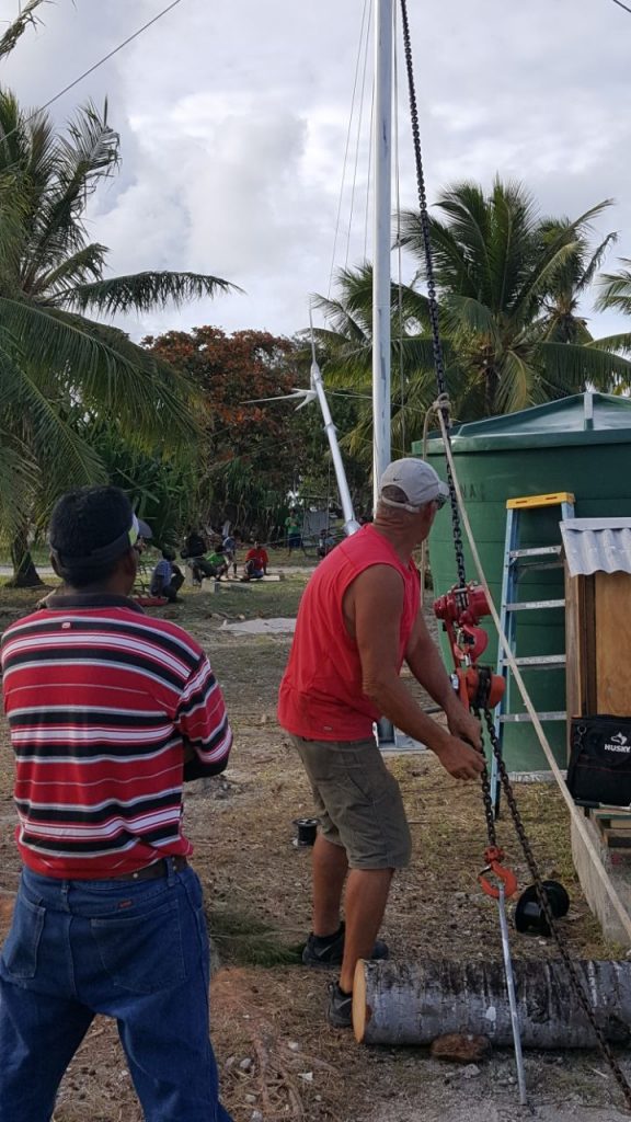 Enewetak wind turbine raising